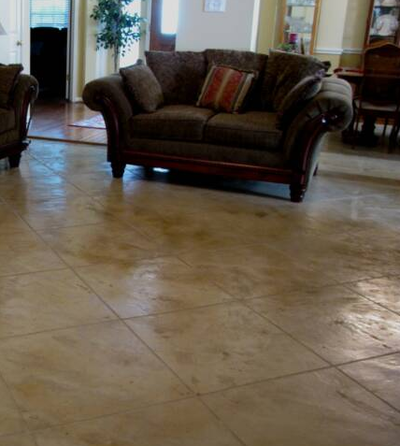 Living room in residential home in Lansing, Michigan with stamped concrete floors.