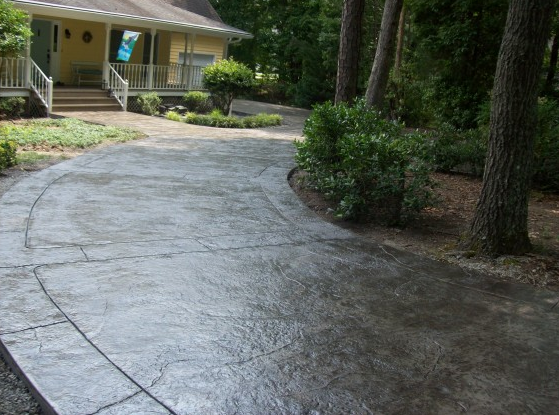 Lansing, Michigan photo of a stamped and stained concrete driveway.