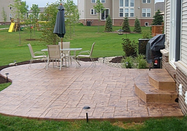 Back yard stamped patio in subdivision outside of Lansing, Michigan