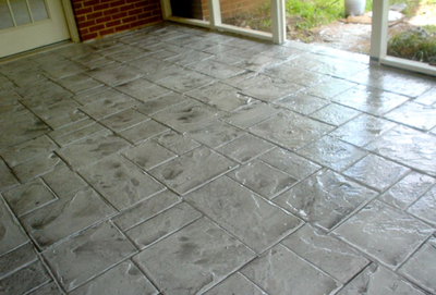 Front entry porch with a stamped concrete design. 