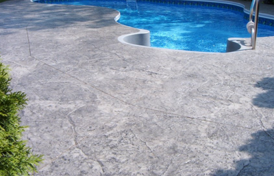 Lansing stamped concrete completed job of a stamped pool deck.
