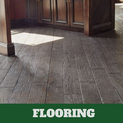 Interior floor stamped in a slate gray wood grain in downtown Lansing, Michigan.